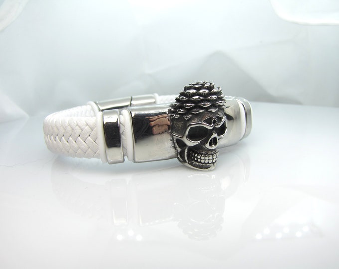 Genuine leather bracelet with stainless steel magnetic clasps , Scull slide and two Europian charms