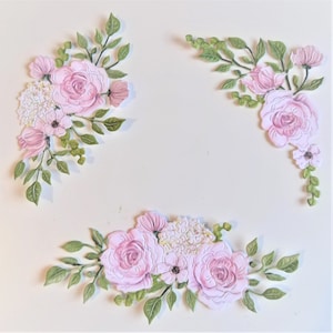 Roze gestanste bloemtakjes, set van drie delicate bloempapierstansen