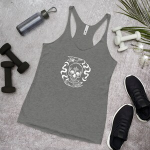 May include: Gray tank top with a white graphic of a skull surrounded by hands and snakes.