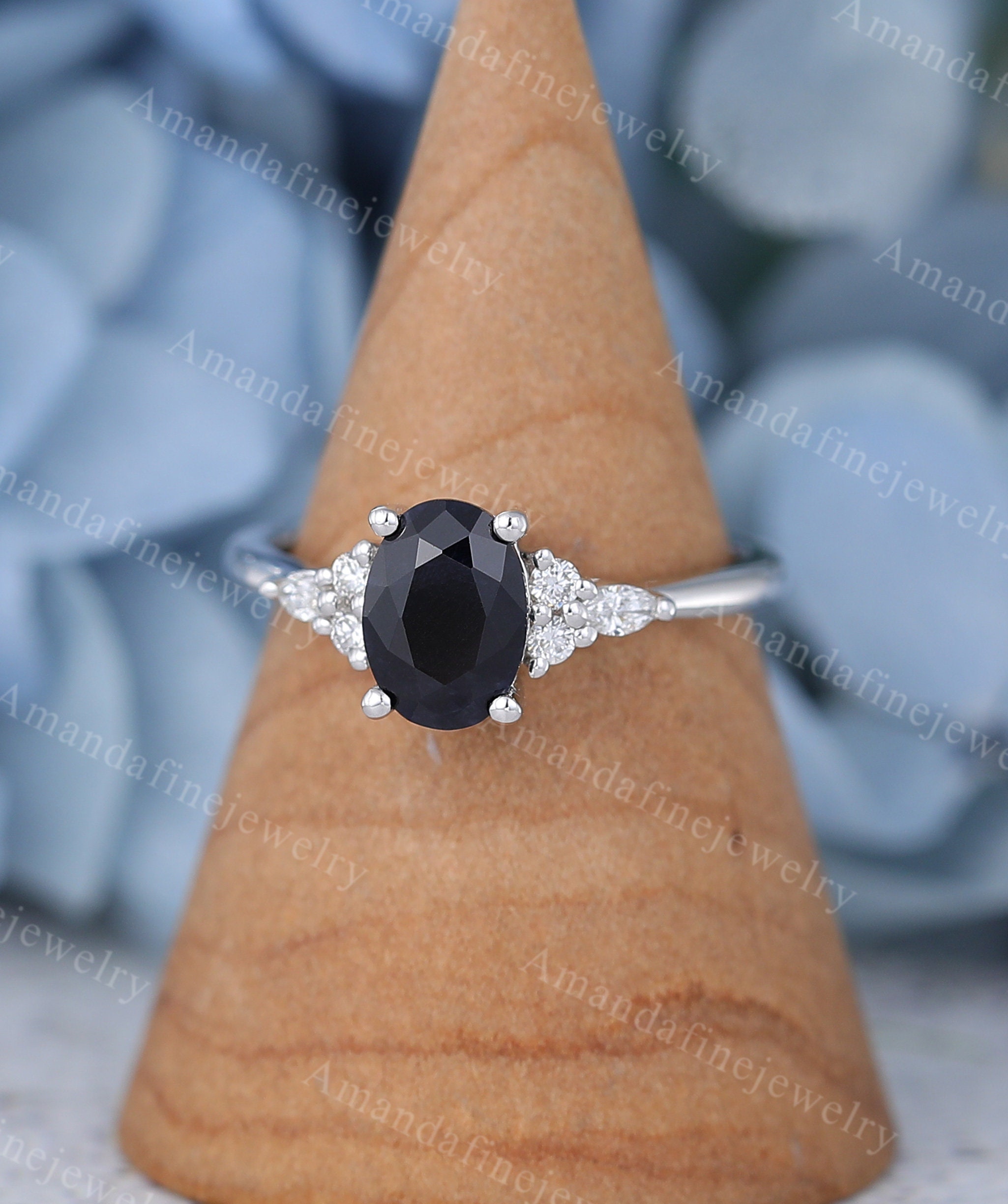 Flame design round brilliant cut black sapphire and diamond three ston –  Mondial by Nadia