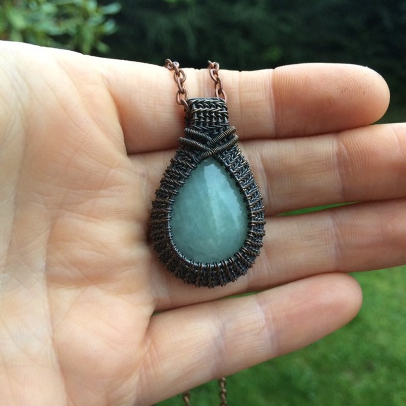 Aquamarine wire wrapped pendant