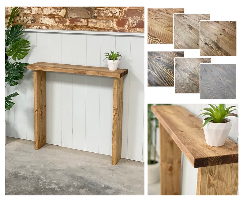 May include: A rustic wooden console table with a natural wood finish. The table has a simple design with two legs and a rectangular top. A small potted plant sits on the table top.