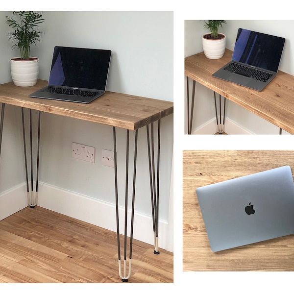 May include: A wooden desk with hairpin legs and a laptop computer on top. The desk is in a corner of a room with a white wall and a wooden floor.