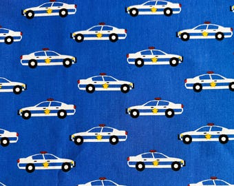 Heroic Police Cars on Blue Cotton Fabric