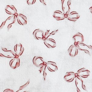 Cotton Fabric:  White Background with Pink Bows