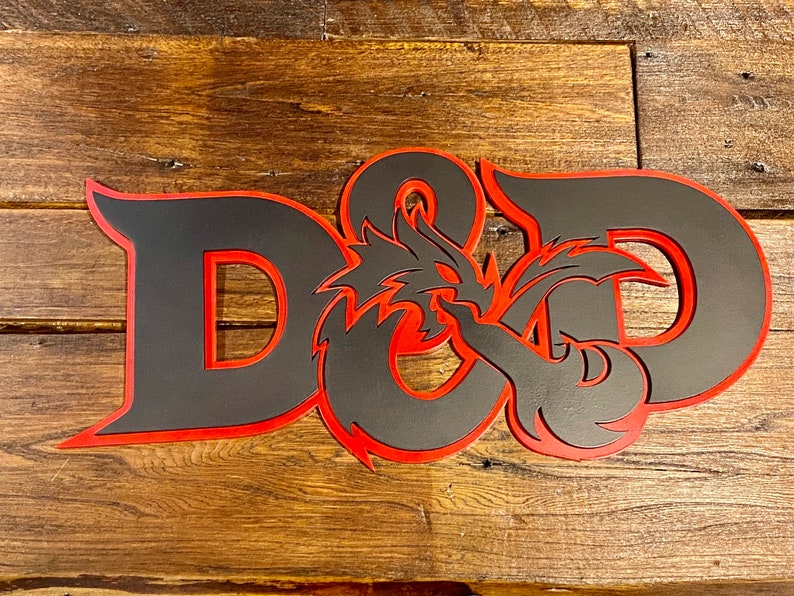 May include: A black and red wooden sign with the letters "D&D" and a dragon design.