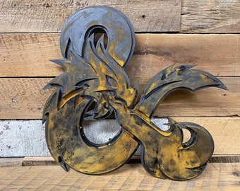 May include: A metal D20 dice with a dragon design. The dice is painted in a black and gold color scheme. The dice is a popular item for tabletop role-playing games.