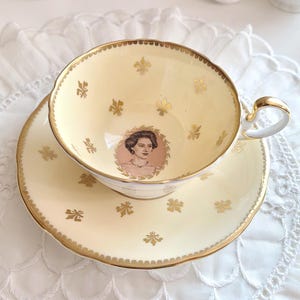 Aynsley Queen Elizabeth II teacup and saucer set -Yellow 1957 - England