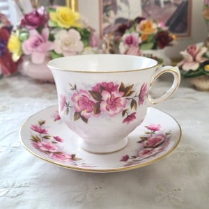 Queen Anne pink flower teacup and saucer set (crazing) - England