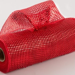 May include: A roll of red mesh ribbon with a shiny finish. The mesh is a fine weave and the ribbon is rolled on a cardboard core.