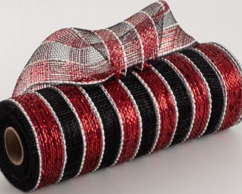May include: A roll of 10-inch wide red, black, and silver striped metallic mesh ribbon. The ribbon is made of a shiny, metallic material and has a woven texture.