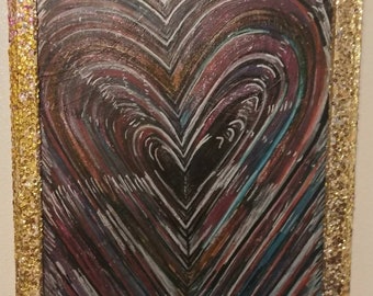 Heart painting with gold sequence frame