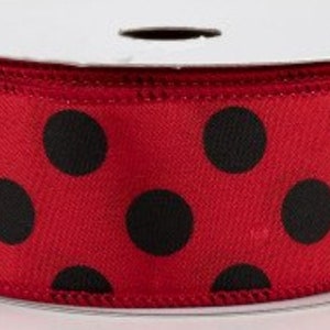 May include: Red satin ribbon with black polka dots.