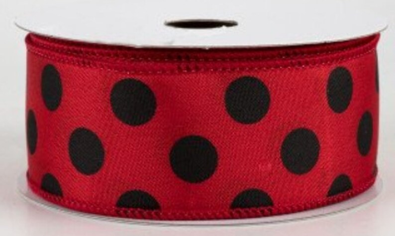 May include: Red satin ribbon with black polka dots.