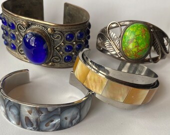 Assorted vintage open back bangle bracelets. Each sold separately.