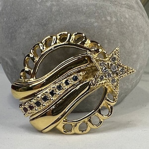 1940s Gold plated sterling silver star and flag brooch with genuine diamonds, sapphires and rubies