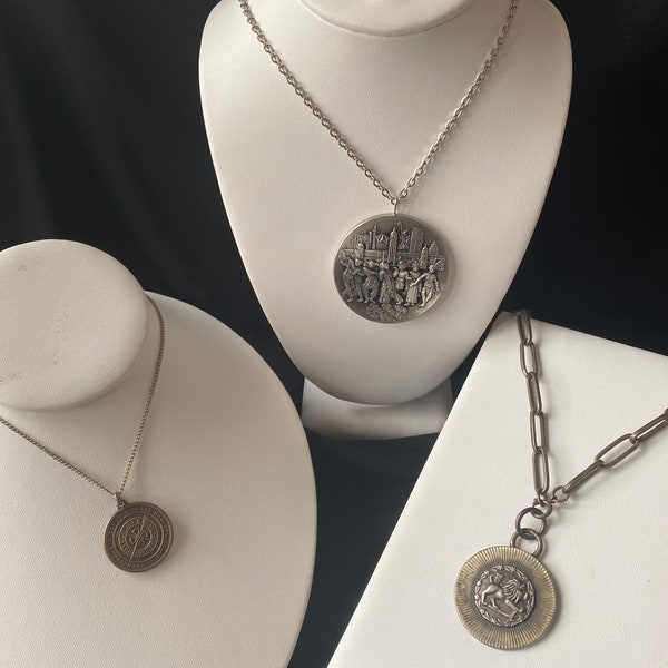 Assorted medallion necklaces. Each sold separately. See description for individual details.