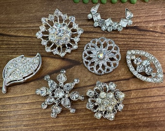 Assorted Vintage rhinestone Brooches. Each sold separately.