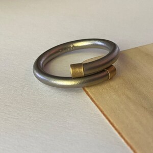 Size 9 Titanium wedding band ring. Titanium and silver.