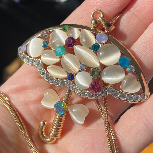 Large vintage umbrella pendant with cat’s eye rhinestones and clear and coloured rhinestones on 30” chain