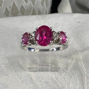 Stamped 925 ring with  cubic zirconium clear and red stones - size 9