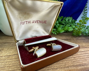 Vintage Fifth Avenue mother of pearl tie bar and cuff links in original box.