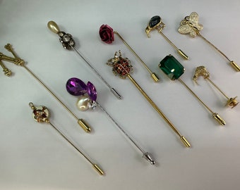 Assorted vintage stick pins, lapel pins, hat pins. Each sold separately