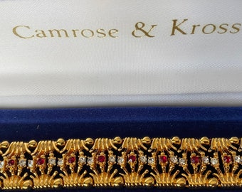 Camrose and Kross JBK bracelet with red and clear stones.