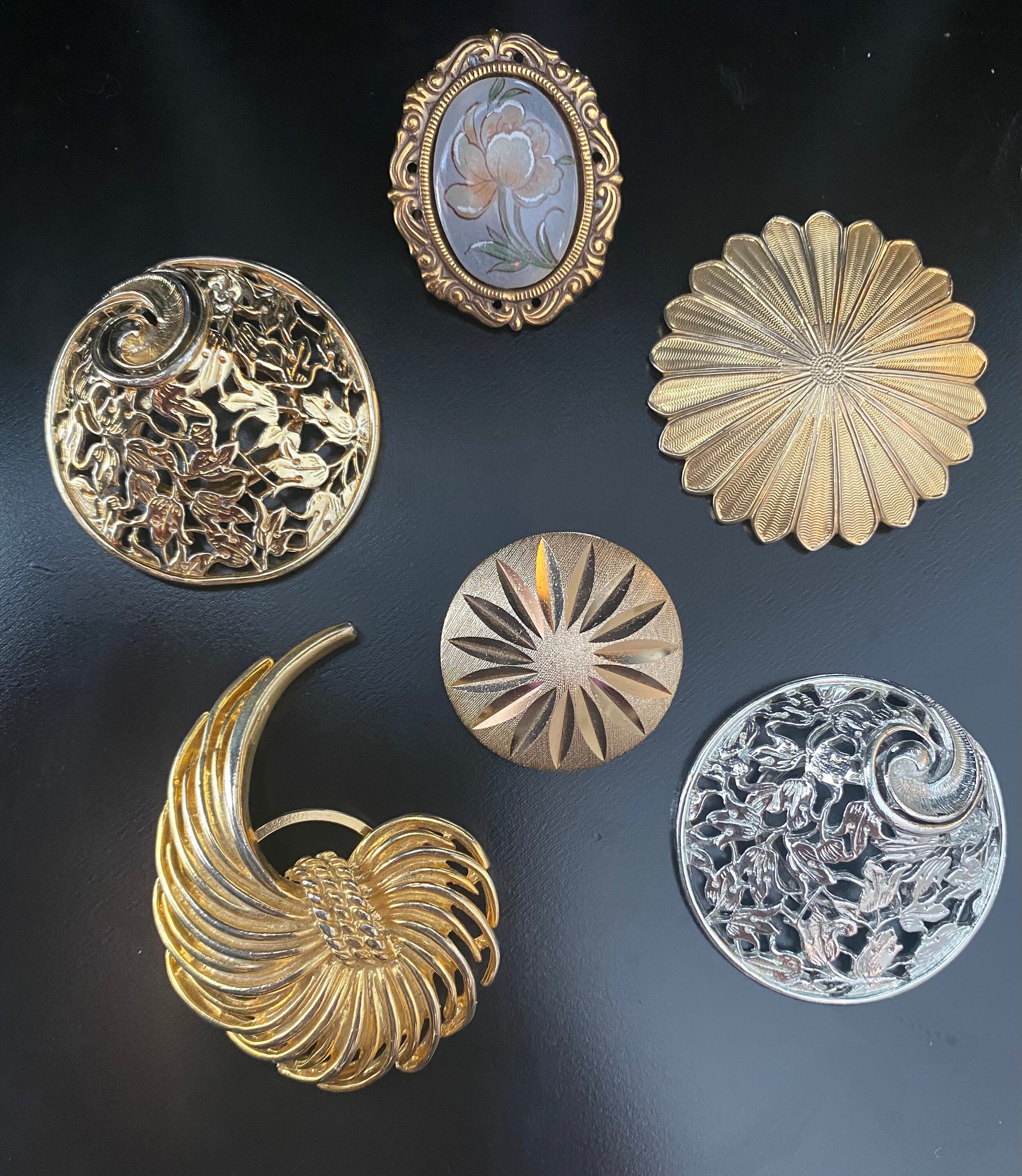 Assorted vintage scarfe clips. Each sold separately.
