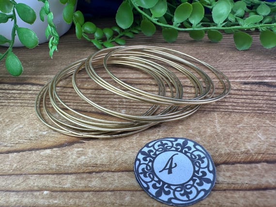 Assorted vintage stackable bangles and bracelets … - image 5