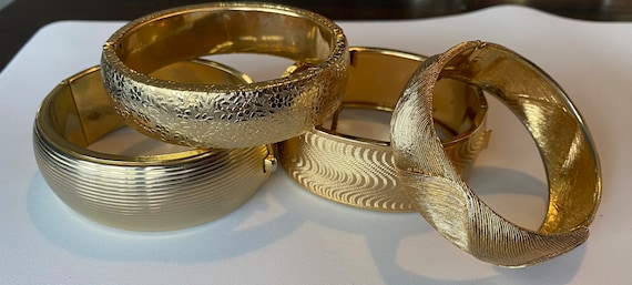 Assorted vintage hinged bangle bracelets. Each so… - image 1