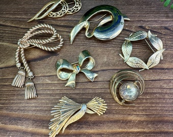 Assorted Vintage Brooches. Each sold separately.