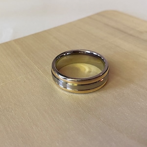 Size 11 Titanium and 14KT yellow gold wedding band ring.