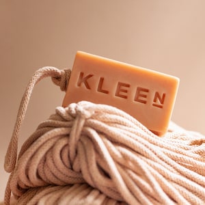 A fun and flirty Soap on a Rope with Lemon Verbena, Lime and Black Pepper Essential Oils. Made with pink French Clay and a matching rope.