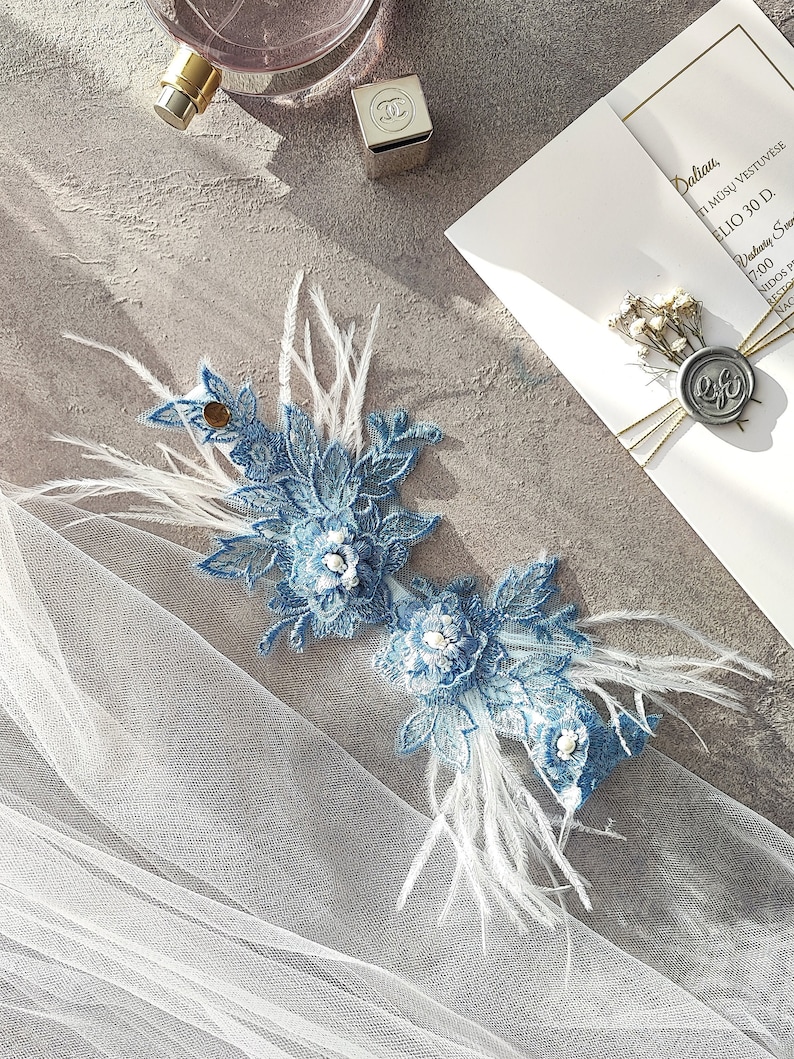 Blue wedding garter with feathers