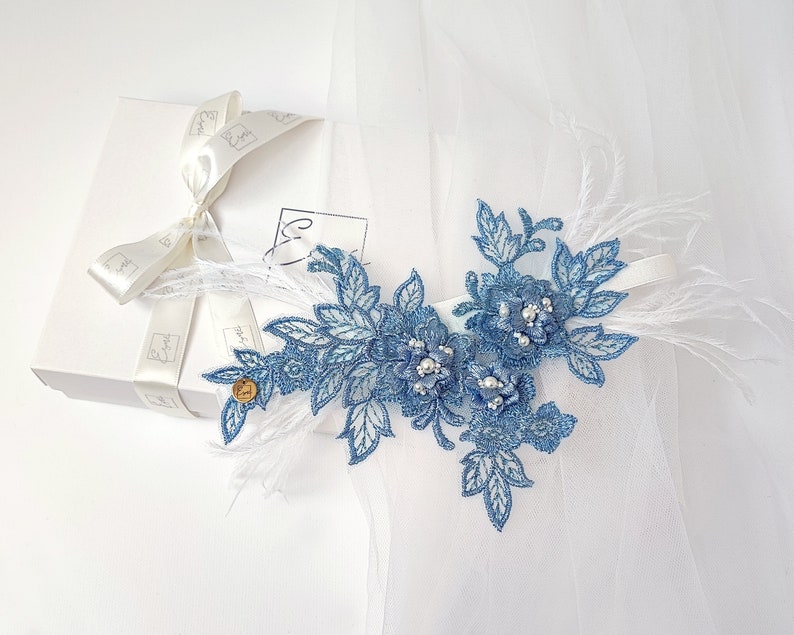 Blue wedding garter with feathers