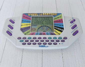 Vintage 90er Jahre Wheel of Fortune Elektronisches Taschenspiel von Tiger