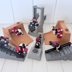 Juego vintage de Tony Hawk, figuras de la Cajita Feliz de McDonald's, BoomBoom, HuckJam (2004)