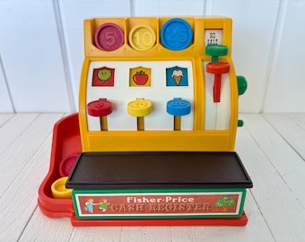 Caja registradora de juguetes Fisher Price vintage de 1974 (con monedas) n.° 926