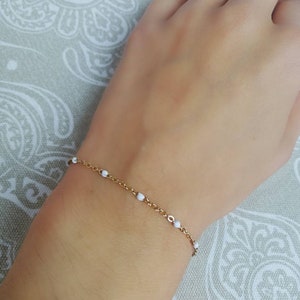 Lily Nieva - Waterproof, tarnish proof, hypoallergenic gold & white bead dainty minimalistic simple bracelet