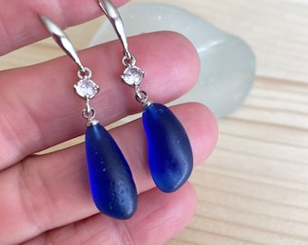 Sea glass earrings. Sterling silver earrings with zirconia, Cornflower blue sea glass earrings. Blue sea glass.