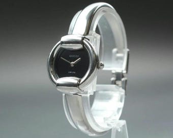 Near Mint Gucci 1400L Stainless Steel Watch with Black Dial to fit 6 1/4-6 1/2 inch Wrist