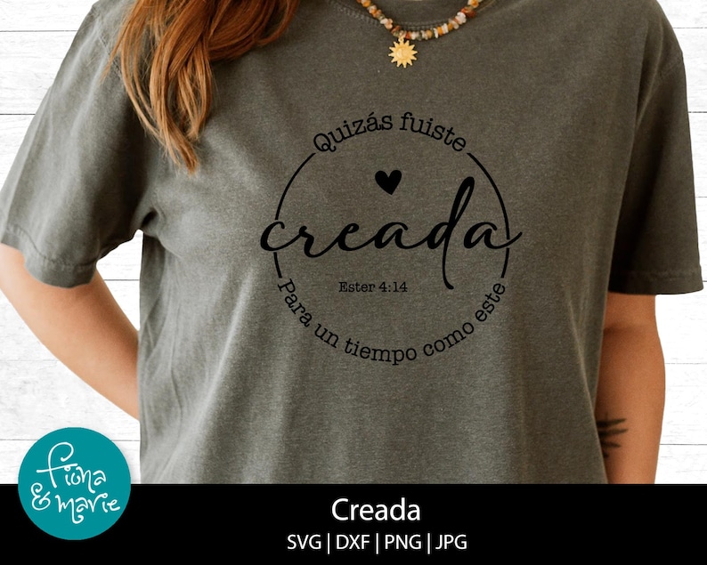 May include: A gray t-shirt with a black circle design that says "Quiz&aacute;s fuiste creada Ester 4:14 para un tiempo como este".