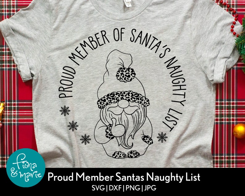 May include: A gray t-shirt with a black and white graphic of a gnome wearing a hat with a leopard print. The text "Proud Member of Santa's Naughty List" is written in a circle around the gnome.