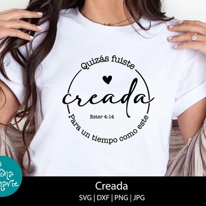 May include: White t-shirt with a black circle design that says "Quiz&aacute;s fuiste creada para un tiempo como este" with a heart and the scripture reference "Ester 4:14".