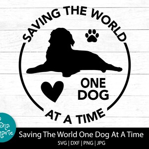May include: Black and white silhouette of a dog lying down with a paw print and heart. The text "Saving the World One Dog At A Time" is in a circle around the dog.