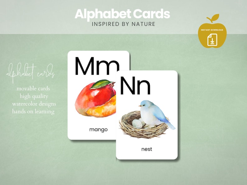 Peut inclure: Deux cartes d'alphabet avec des illustrations &agrave; l'aquarelle. La premi&egrave;re carte montre la lettre "M" et une mangue. La deuxi&egrave;me carte montre la lettre "N" et un oiseau dans un nid. Le texte "mangue" et "nid" est imprim&eacute; sous les illustrations.