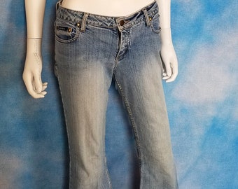 Vintage Mid to Late 90s Y2K Faded Light Wash Denim Low Rise Flare Jeans, Lightly Distressed/ Candie’s/ 30” waist (hips) 28” inseam