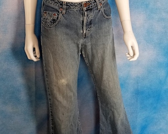 Vintage Late 90s Y2K Light Wash Distressed Faded Mid Rise Button Fly Flare Jeans/ Silver Jeans/ 28” waist, 28.5” inseam