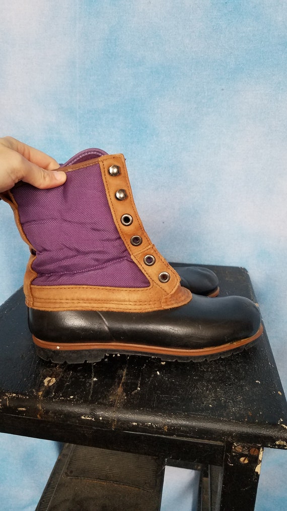 Black and sales tan duck boots